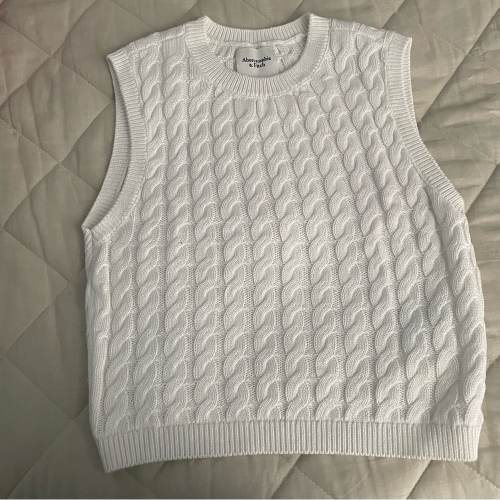 White sweater vest